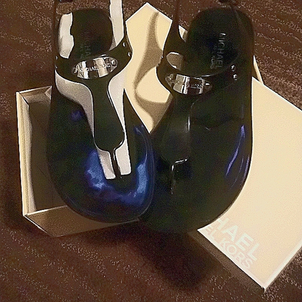 Brand new💄🌸 Michael Kors sandals.  Beautiful black with Silver Emblem on top